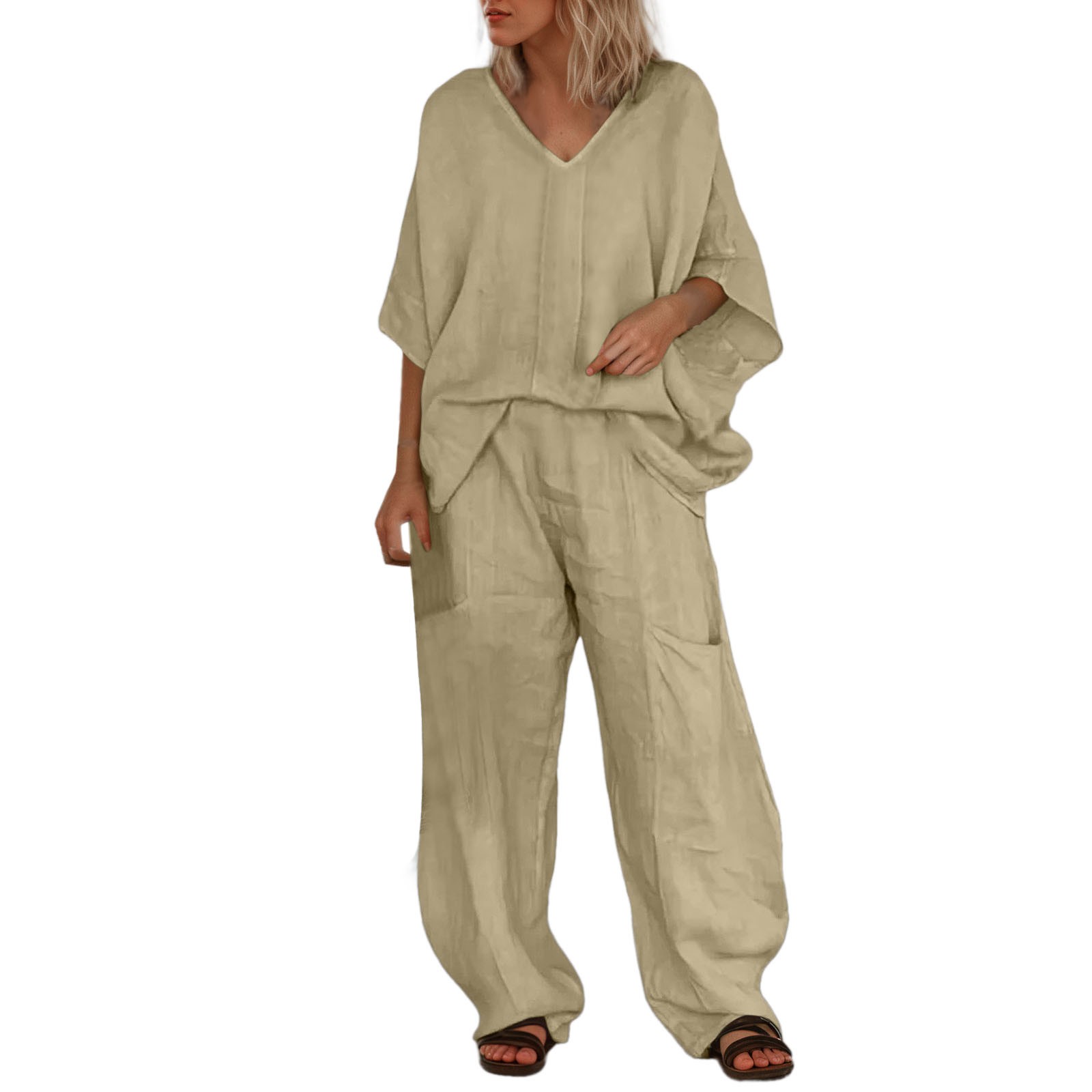 thumbnail image 1 of Traje pantalón de mujer de color liso con cuello en V: blusa informal con pantalones holgados, manga media y bolsillos., 1 of 3